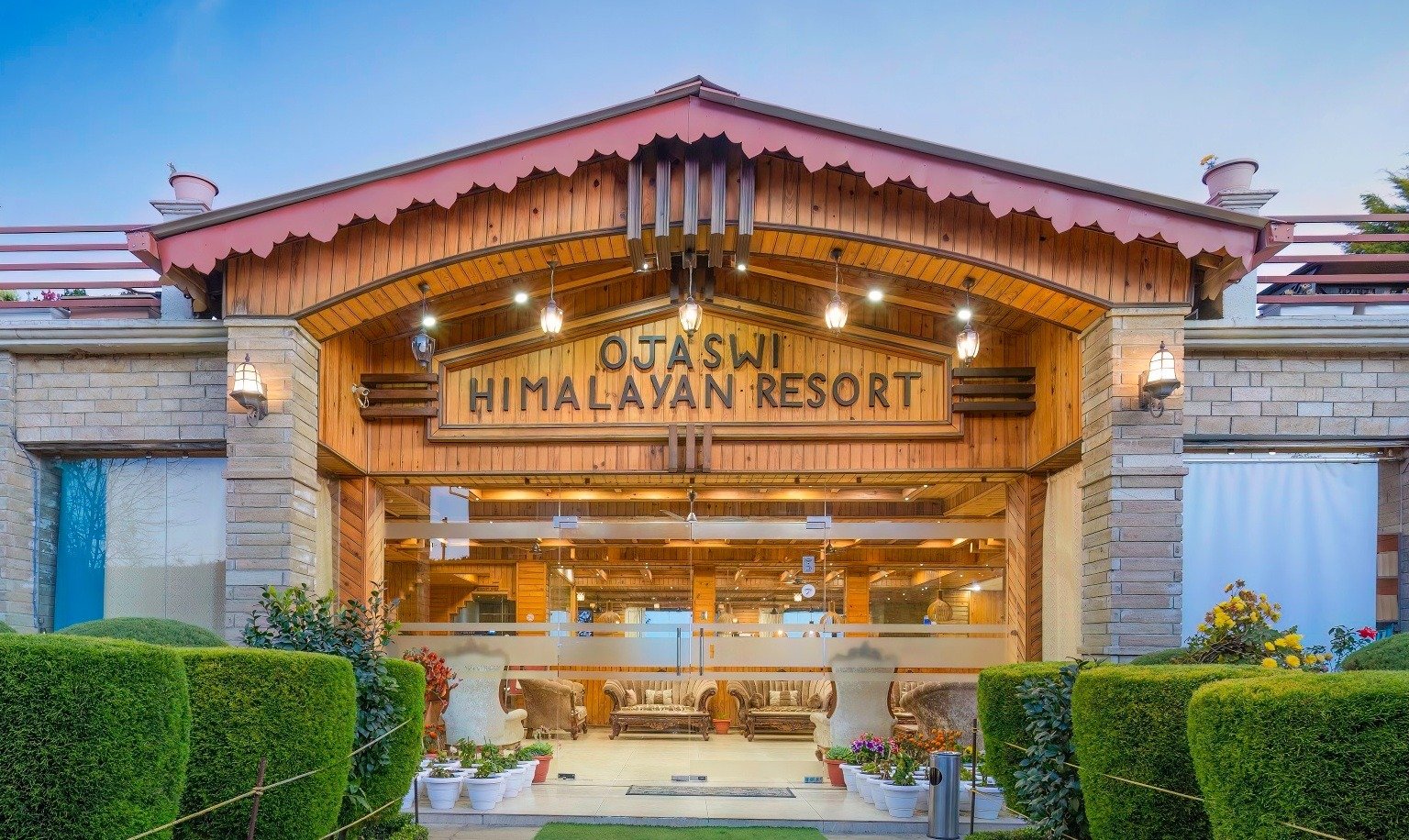 Contact Ojaswi Himalayan Resort Mukteshwar for bookings and inquiries, featuring scenic mountain views and luxury hospitality.