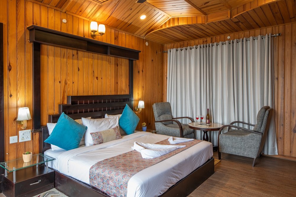 Ojaswi Family Suite at Ojaswi Resort Mukteshwar, a luxury two-bedroom suite with beautiful Himalayan views.